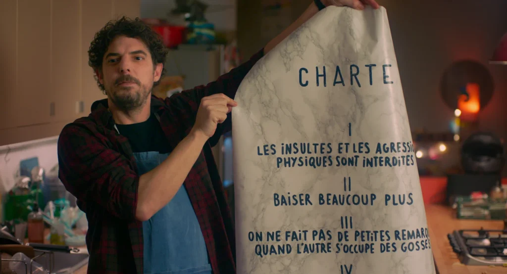 Damien Bonnard tient la charte du Processus de paix.